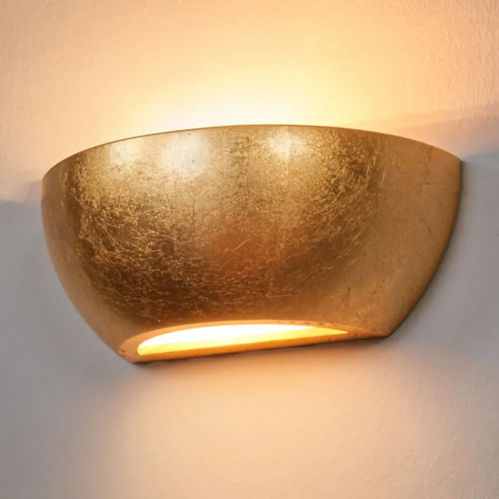 Lindby Kolja vegglampe med gullfoliefinish| Design- Og Hotellbelysning|Vegglamper