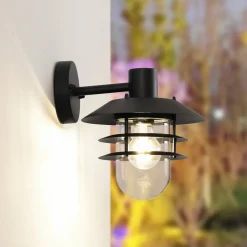 Lindby Meliora utendørs vegglampe, svart, jern, IP44, E27 Clearance