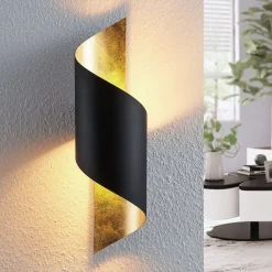 Lindby vegglampe Vanni, svart/gull, metall, høyde 57 cm| Design- Og Hotellbelysning|Vegglamper