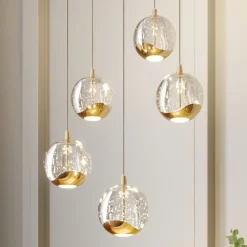 Lucande LED-pendellampe Hayley, Ø 30 cm, 5 lyskilder, gull, glass