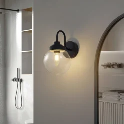 Lucande vegglampe Badolo, svart, glass, 25 cm høy, IP44