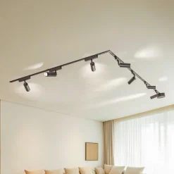 Lindby Skinnesystem 48V Lumaro, spots, 7 lyskilder, svart, Ø 4cm