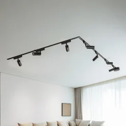 Lindby Skinnesystem 48V Lumaro, spots, 7 lyskilder, svart, Ø 4cm