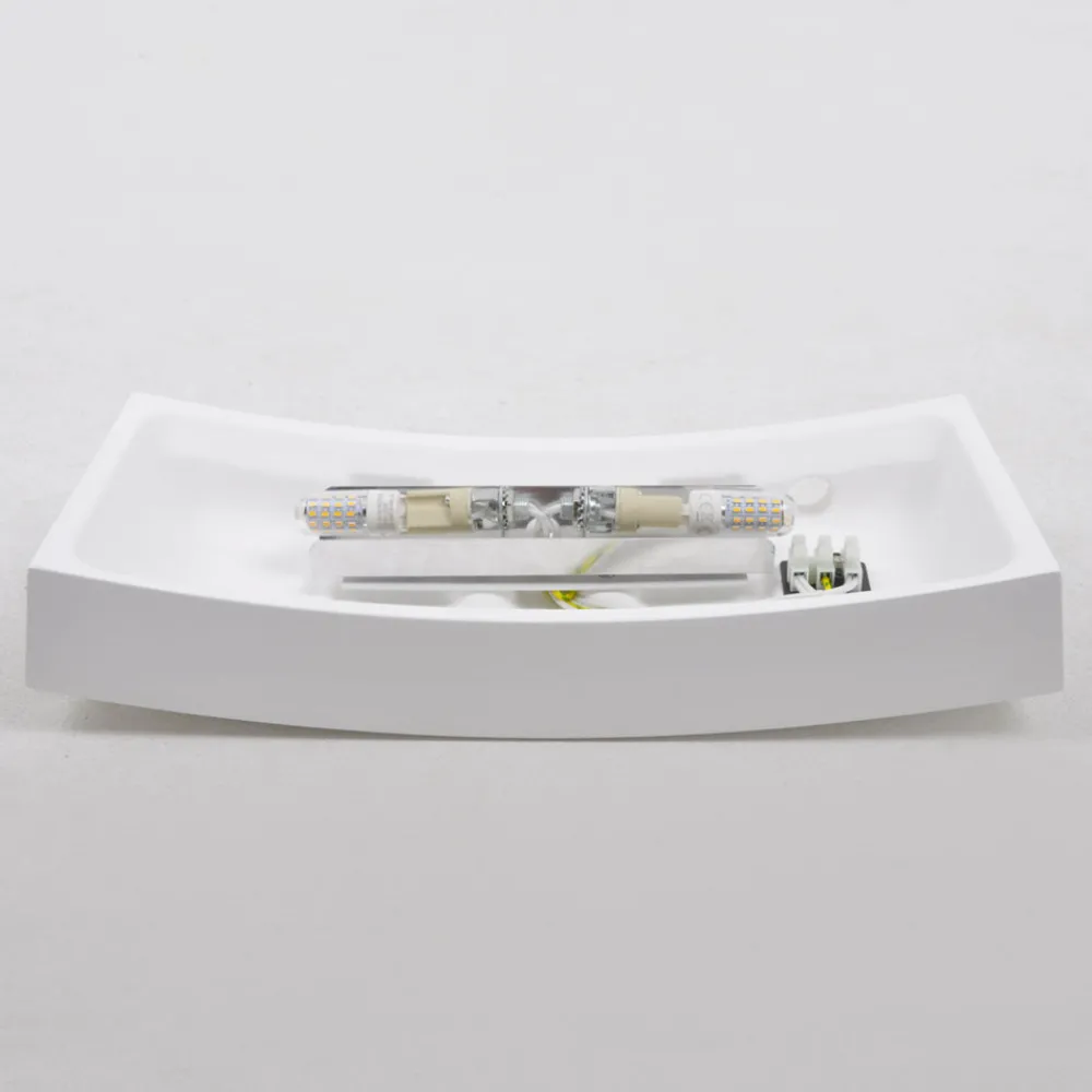 Lindby Svakt buet vegglampe Leander, malbar Discount