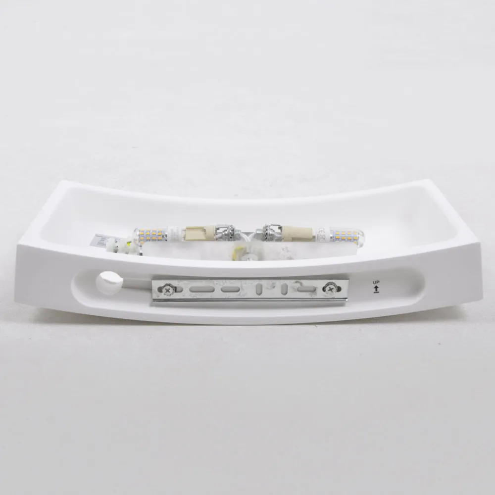 Lindby Svakt buet vegglampe Leander, malbar Discount